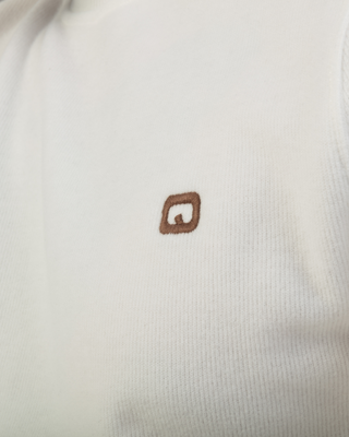 Col roulé beige de Qaba'il